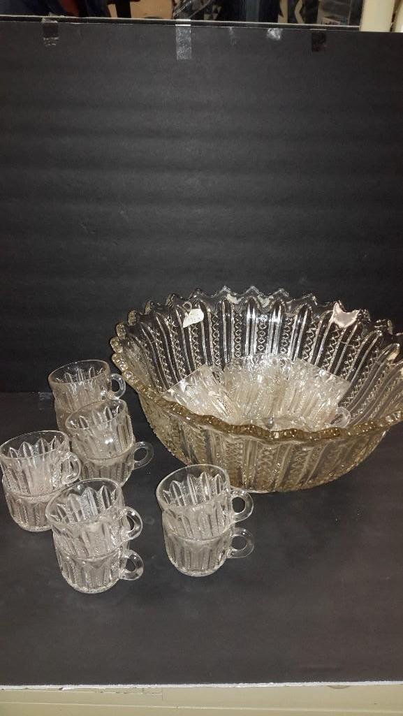 Depression Glass Punch Bowl with Cups (18): 15 inch wide and 7 inch tall Depression glass punch bowl with cups in good condition. 