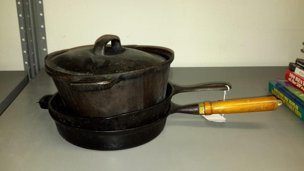 Cast Iron Pans (3): One has a lid, ranging in size 4.5" by 12" to 2" by 19"