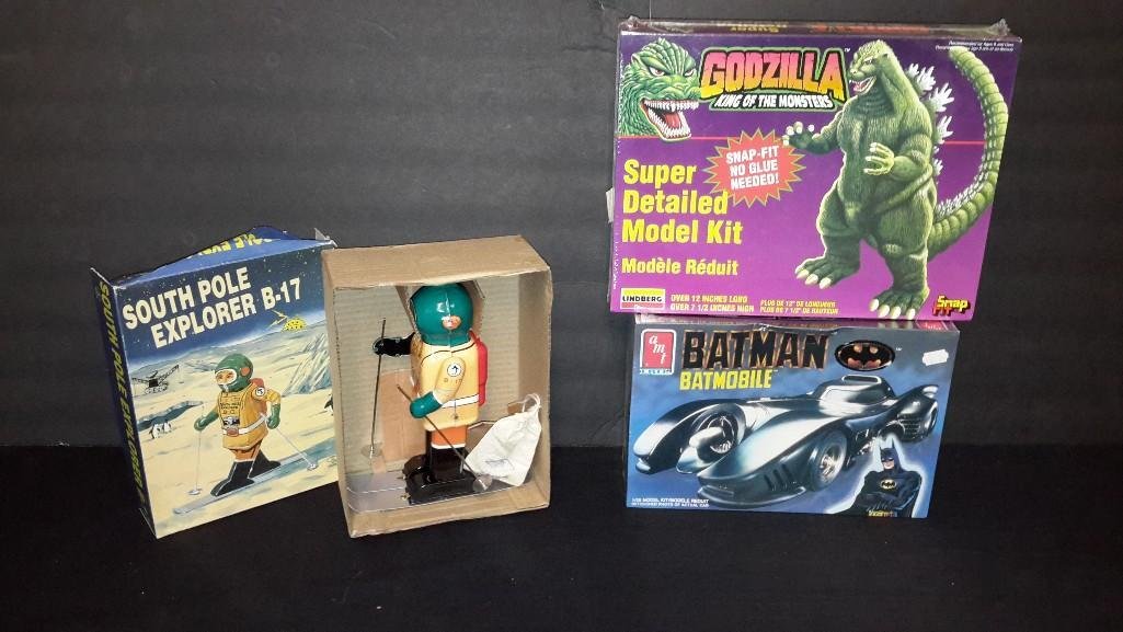 South Pole Explorer B-17 & (2) Plastic Model Kits: Batman & Godzilla model kits, & Friction powered south pole explorer B-17 all come in original packaging