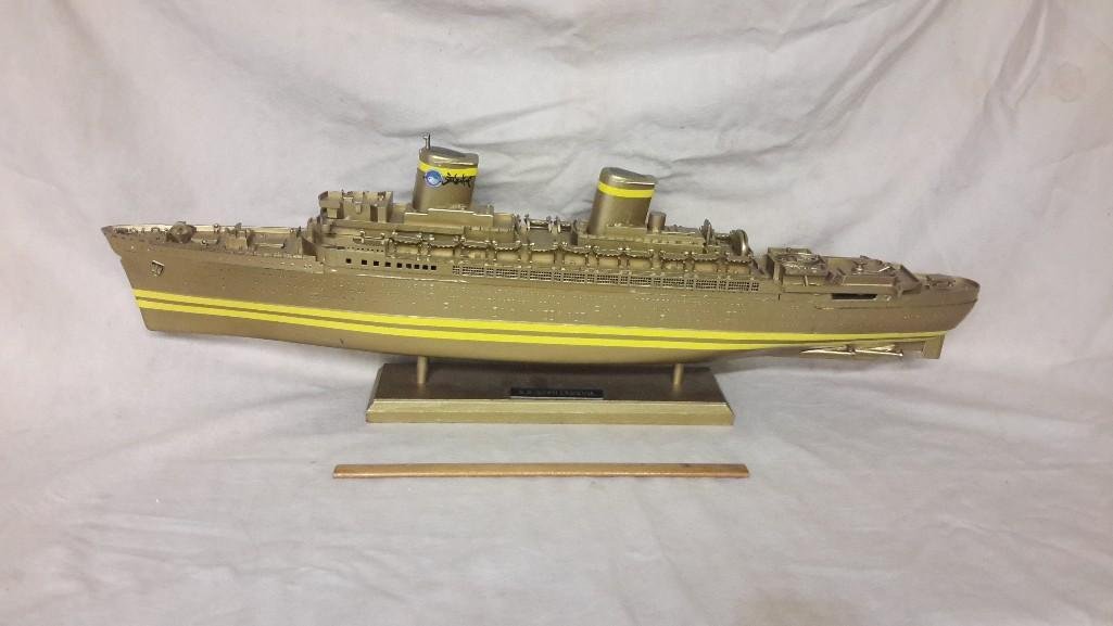 S.S. Stan Lemkuil Ship Model: Gold and yellow in color. Spot on top shows missing piece (small). Measures 28 1/2" wide x 9" tall. 