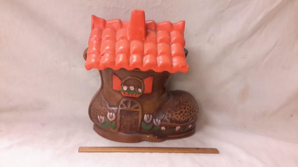USA Shoe House Cookie Jar: Marked USA along side near the heel, measures 12" tall, 11" long, has a couple chips on the roof
