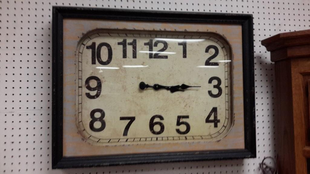 Large Wall Clock: Battery operated. Large numbers, measures 30" wide x 22" long x 4" deep.