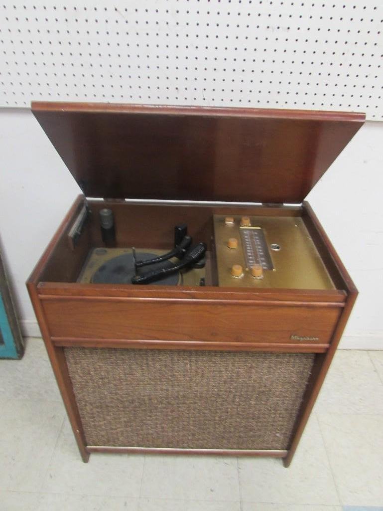 Magnavox Phonograph Radio Cabinet: Has old tubes, electric and does turn on. may need new tubes. Cabinet in Good condition for age. Measures 26" w x 30" t x 16" d.