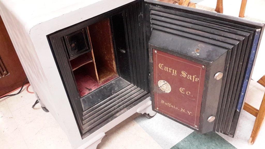 Large Cary Combination Safe: Inside reads, Cary Safe Co. Buffalo, N.Y. Measures 33" tall, 22" wide and 22" deep. Has wheels. HEAVY. Combination included. 