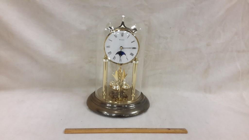 Dome Anniversary Clock: Schmeckenbecker made in Germany. Measures 11" tall. Battery Operated.