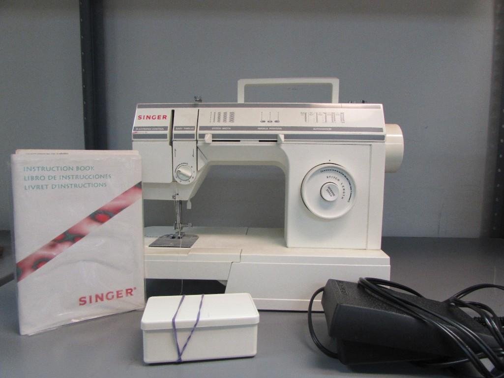 Singer Sewing Machine:  Amps 1.0, 60 Hz. Model #57817C Volts 120. Singer brand. 