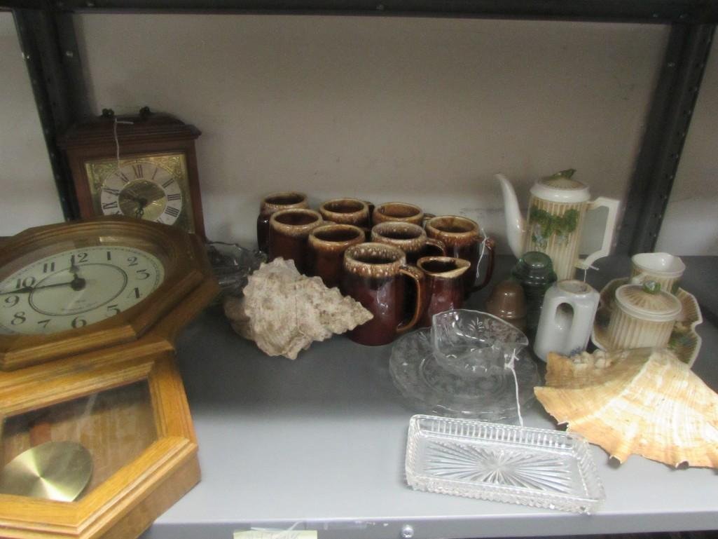 Dishware and Home Decor: Hull mugs (8 plus creamer), teapot with cream, sugar and serving tray Made in Japan, large sea shells, wall clock, mantle clock and more..