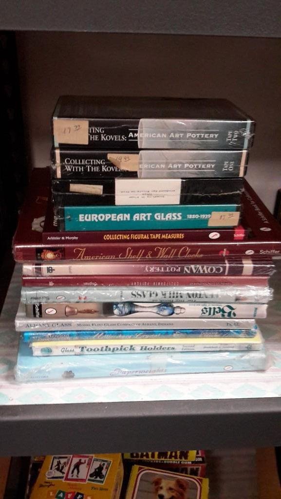 Reference Books and VHS (15): Collecting Figural Tape Measures, Millersburg Crystal, Glass Toothpick Holders, Paperweights, Collectible Bells, California Pottery and more. Also includes VHS; Collecting With the Kovels American Art