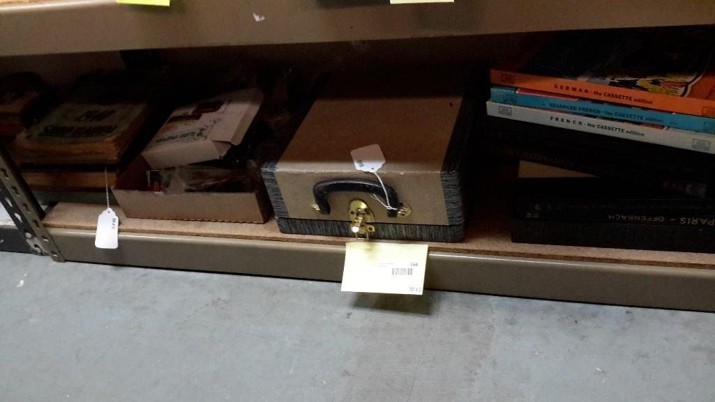 Vintage Items: Cassette collection including German, French and Advanced French. 5 collection books of records that include Dvorak, Remsky Korsakov, Gay Paris and more. Kodak Carousel 800 projector in case, plastic