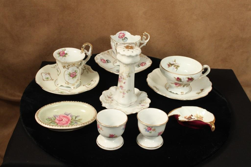 Assorted Porcelain Cups and Saucers: (3) sets of cups and saucers marked Japan, Bavarian salt dips, Limoge and fine China small dishes, and a pepper shaker, 