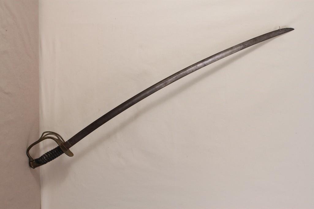 Civil War Saber: Civil War or post U.S. calvary saber, leather and brass handle, no sheath, 40" long