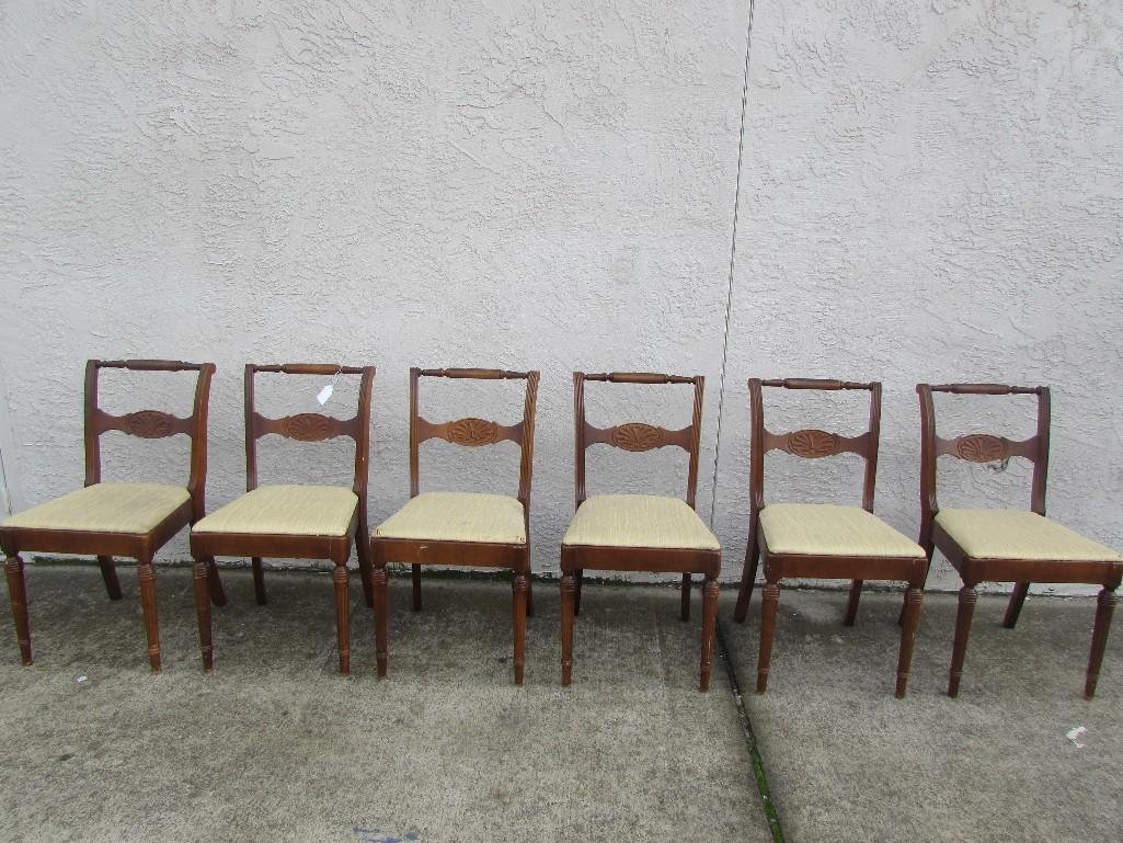Dining room chairs (6): carved wood with upholstered seats. Upholstery shows wear. 33.5" tall