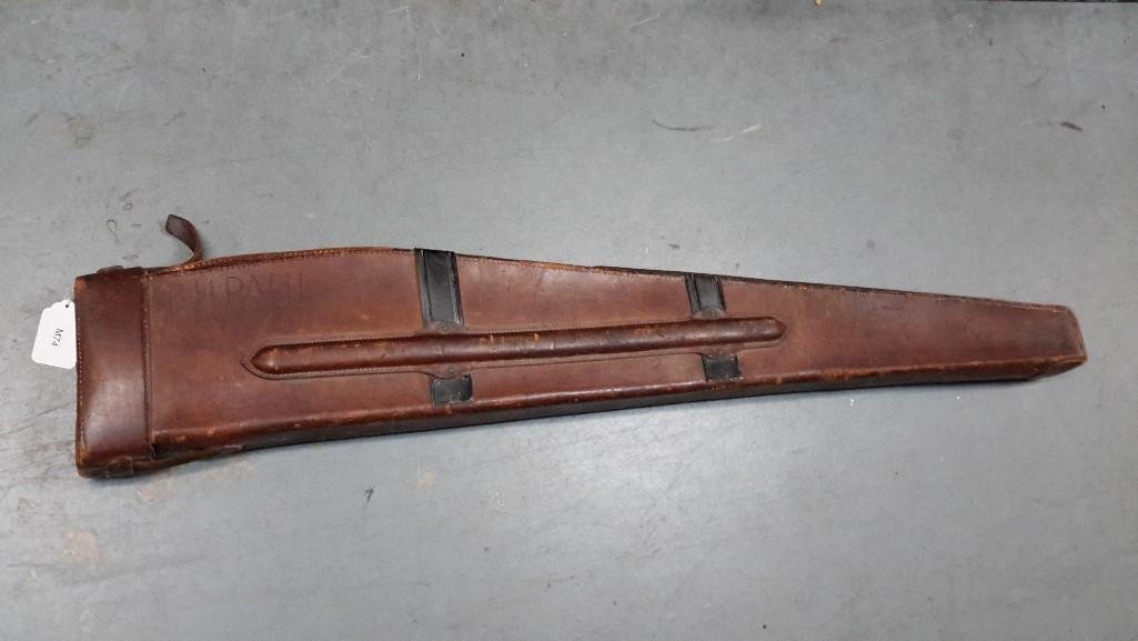 WWII Browning Automatic Rifle Case: Leather case. Has BH Paul carved into the side. Measures 48" long and the top measures 7 1/2". Closes with a rivet. 