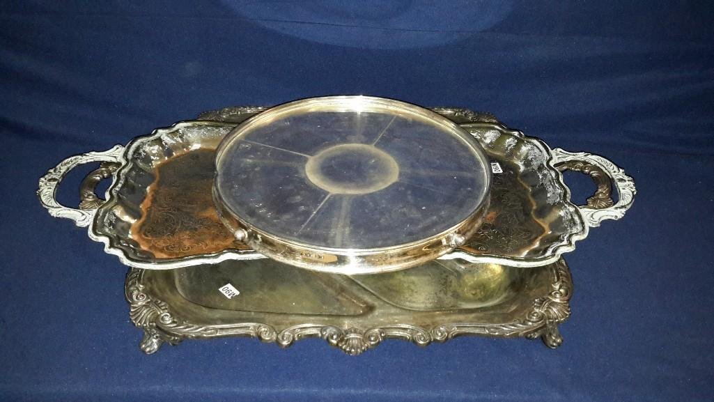 Large Silver Plate Trays (3): Round Lazy Susan, Footed Meat Carving Tray (24" long includes handles) and a 26" long tray shows a lot of patina.