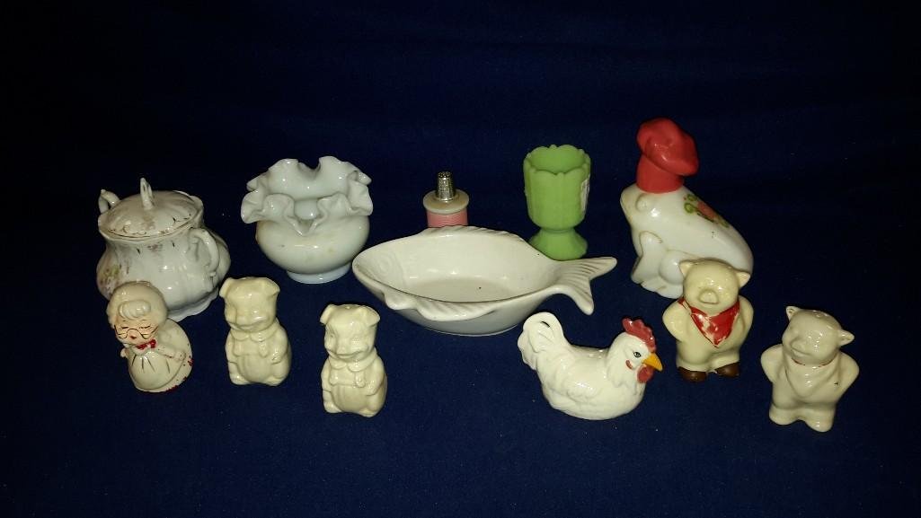 Glassware Collection (12): Six salt and pepper shakers (4 pigs, 1 lady and 1 chicken). Fenton green glass small vase, milk glass vase, fish shaped bowl marked Calif USA 874 and more. 