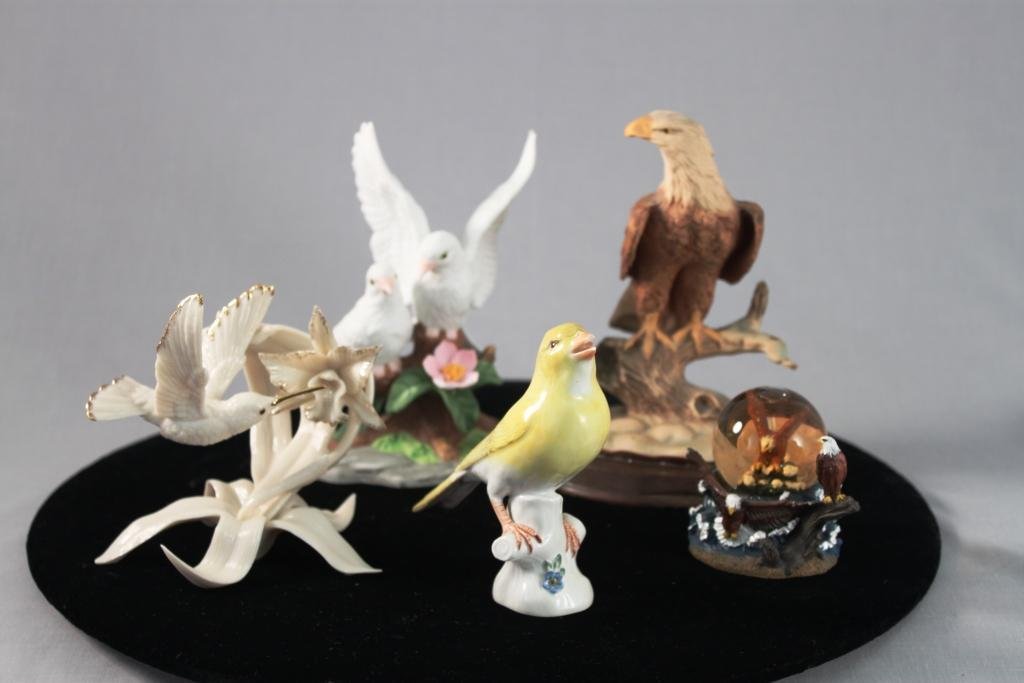 Bird Figurines (5): Lenox humming bird, resin eagle, ceramic dove, ceramic yellow bird (beak has a small chip), and a small eagle snow globe.