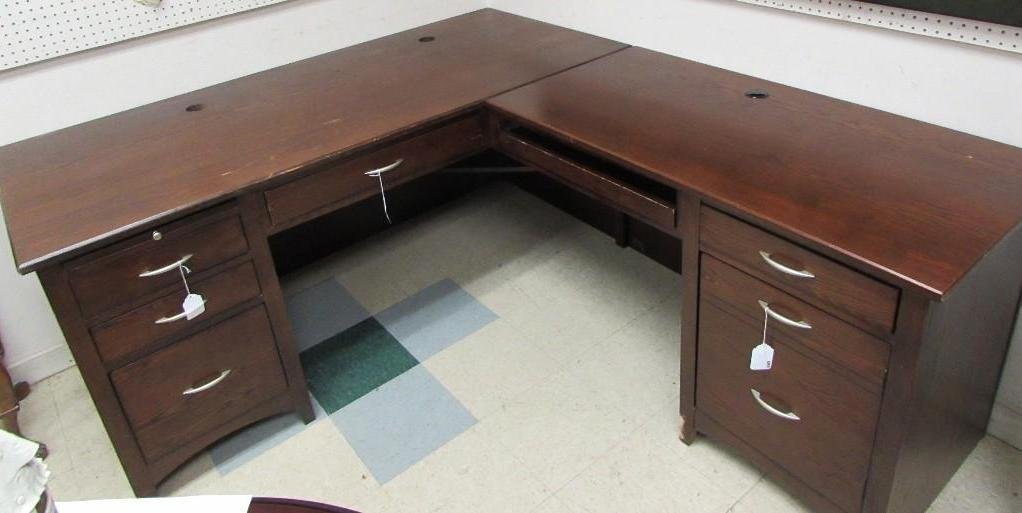 Oak Wood Corner Office Desk: Two part desk, one door, and five drawers, a pull out key board tray, one platform tray, Desk measures 68"x30"x31", extended side part measures 48"x30"x24", shows wear.