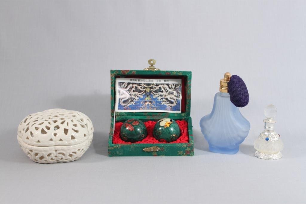 Ladies Perfume Bottles and Trinket Box: Oleg Casini 4.5" trinket box, one vintage blue glass perfume bottle, one modern satin glass and rhinestone perfume bottle, and one set of set of stress balls in box