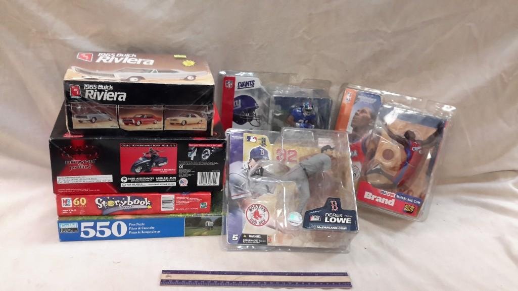 Collectible Toys (7): Two puzzles, Batmobile Model Kit, 1965 Buik Riviera Model Kit, Derrick Lowe Boston Red Sox Action Figure, Elton Brand Clippers Action Figure, Tiki Barber New York Giants Action Figure