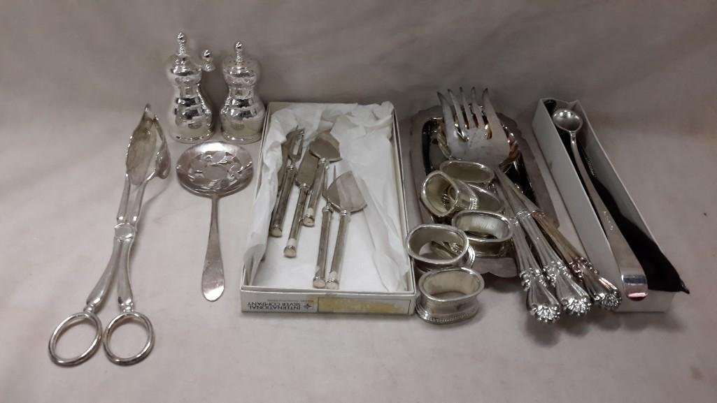 Silver Plate Serving Ware: Salt and Pepper shakers, napkin rings, flatware, small serving utensils and more. 