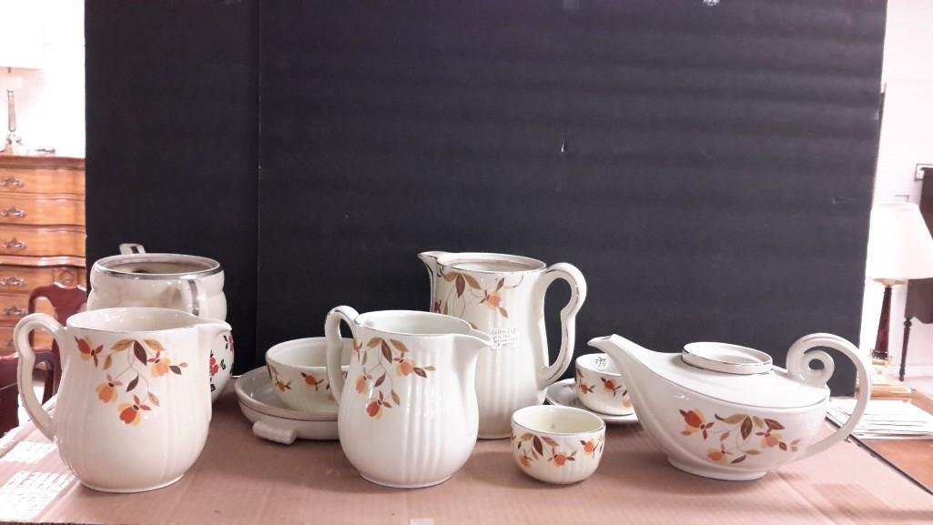 Hall's Dishware (10): Tea pot, two coffee pots, 2 small pitchers, 2 cups, bowl, saucer and a casserole dish lid. All items missing lids. 
