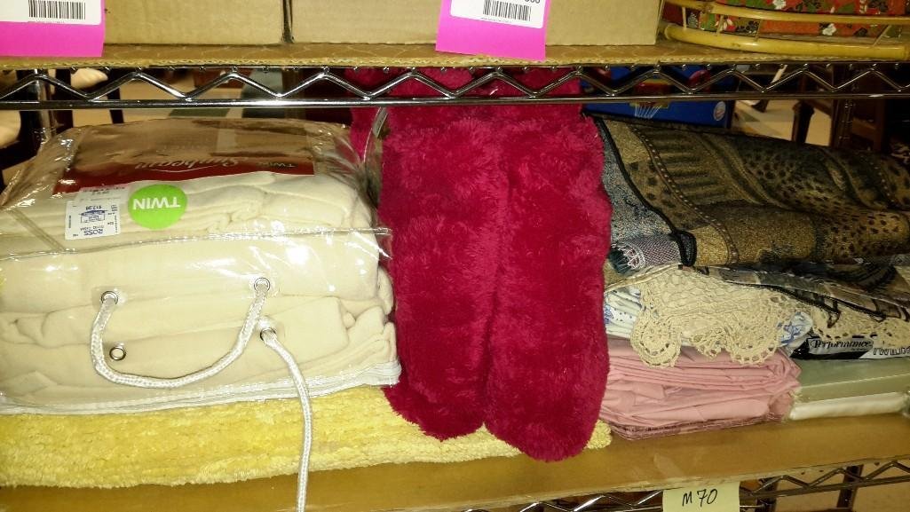 Table and Bed Linen: New in bag fleece twin size sheet set, New Fluffie throw 50" x 60", table runners, pillow cases new in the package, Queen size flat sheet by Carter Club, and more.