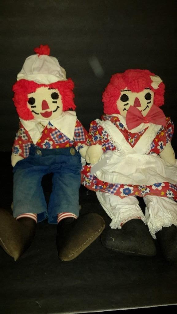 Raggedy Ann and Andy Plush Dolls: Measure 22" tall. Shows some wear to the clothing.