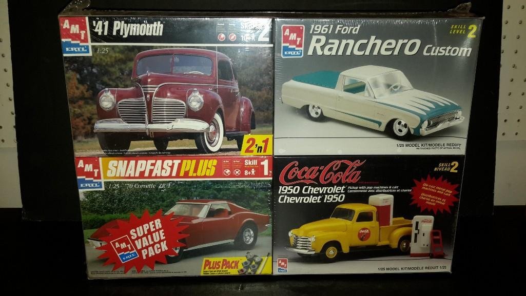 AMT Classic Model Kit Value-Pack: Includes: four AMT classic Model Kits. 41 Plymouth , 1964 Ranchero Custom, 70 Corvette ZR-1, Coca- Cola 1950 Chevrolet. Box measures 13" tall, 19" long. NEW