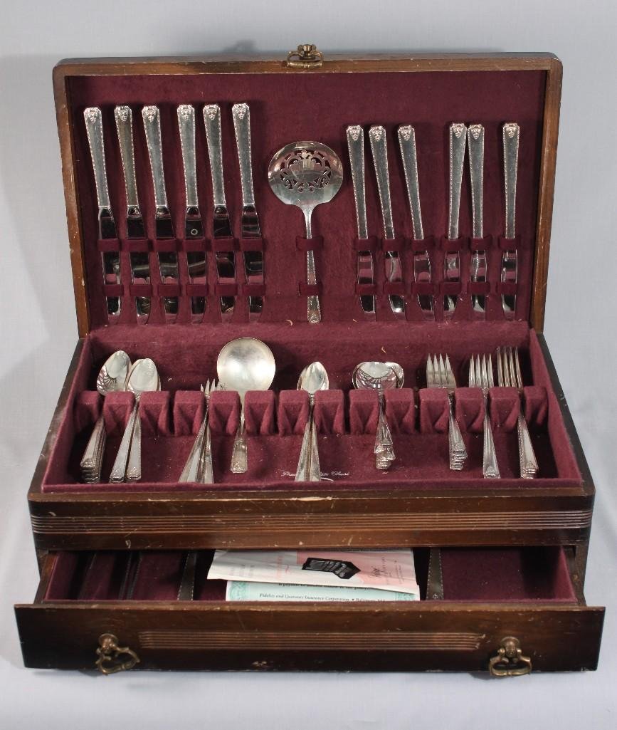 Prestige Silver Plate Flatwear: with box, soup spoons, knives, salad forks, forks, knife sharpener, and other serving utensils.
