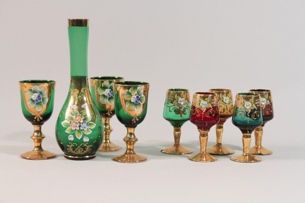 Multi-Colored Gold Guilt Stemware (9): (5) Cordial stems are 4" tall, (3) green wine stems are 4.5", and one green glass vase 8" tall, one cordial has a small chip on bottom rim, othewise in good condition