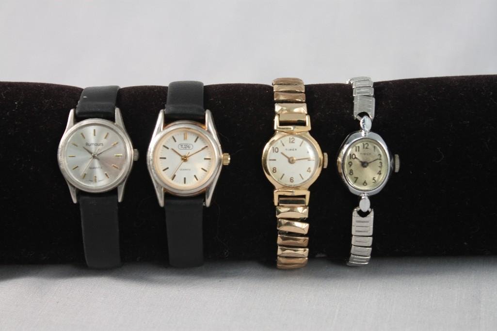 Ladies Wrist Watches (4): Gold tone and silver tone Timex watches with stretch band, and two others with leather bands 