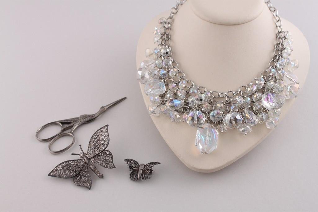 Ladies Costume Jewelry: Silver Butterfly brooches, crystal bib necklace, and one pair of miniature bird scissors 