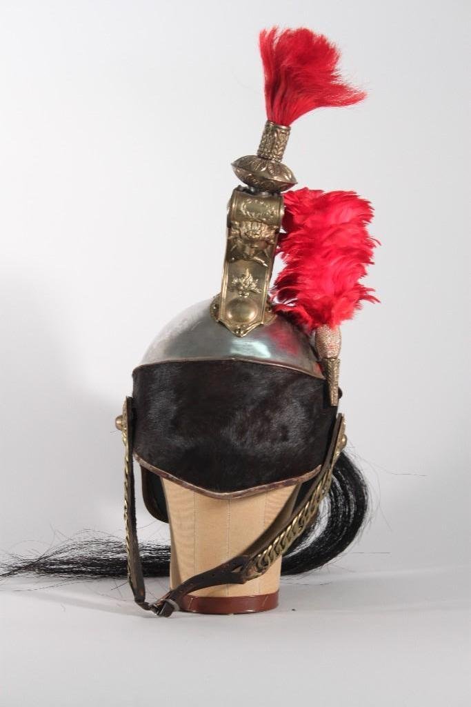 1850 Frenett Cuisere Helmet: Given tag says; Frenett Cuisere with red feather hackle plume. Horse hair round helmet and hanging from top. WE do have a breast plate that matches this, did not get into this auc