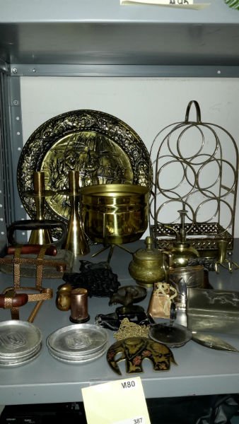 Metal Decor: Lot includes small wine rack, coasters, vintage iron (heavy), oil can, and much more 