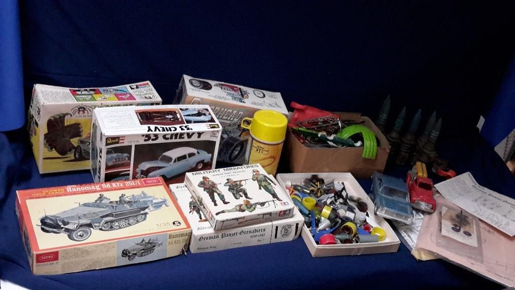 Vintage Model Parts and 20mm Ammo Dummies: Boxes of car and airplane frames, wheels, propellers, and more. Also includes 20mm dummies (ammo). Hot Wheels Thermos, toy cars, 53 Chevy Rebel Model Kit. Includes five collectible model boxes EM