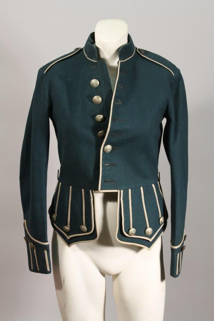 European Uniform Dress Coat: Blue formal uniform dress coat with gold braiding, 24" long and 17" wide at chest. Some of the gold colored buttons are marked Cheshire Constabulary. Coat is in good condition, shows some we