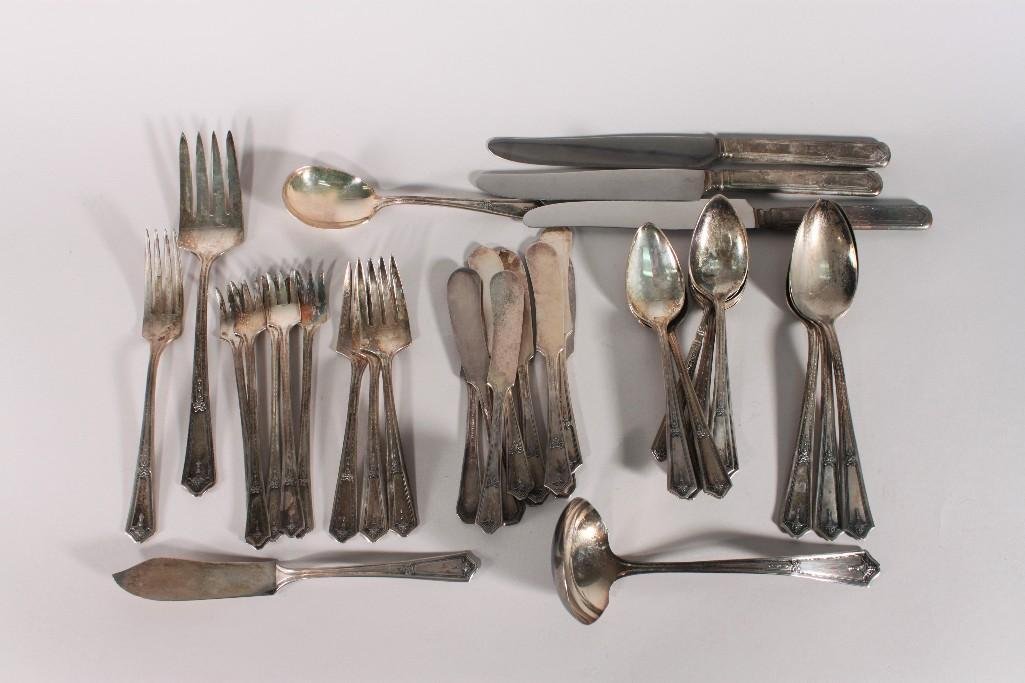 Silver Plate Flatware: assortment of same pattern, (5) pickle forks, one ladle, (9) butter knives, (10) tea spoons, (3) table spoons, (3) dinner knives, (3) salad forks, and more, R.C. Co. Bouquet Plate