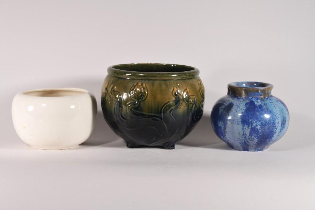 Pottery Bowls: one 4.5" tall white bowl marked Bauer (some hairline cracks), one 5" tall blue multi colored bowl marked on bottom, and one green and blue 6" tall footed bowl