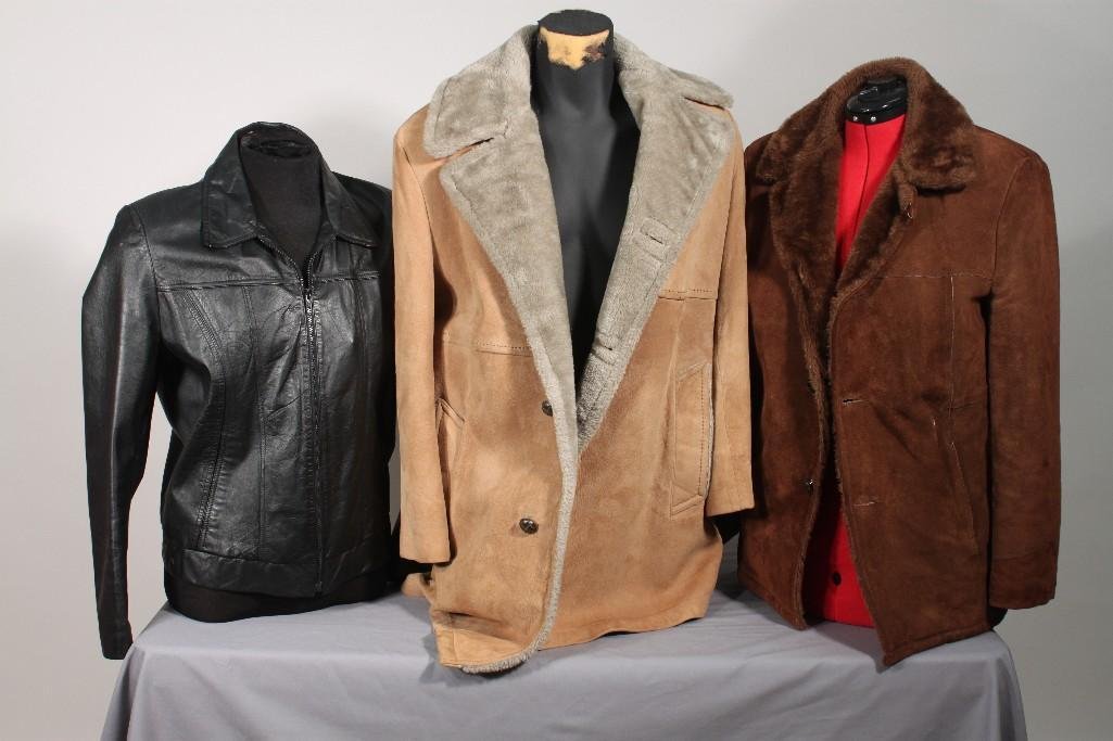 Vintage Suede and Leather Coats (3): One Mighty Mac Sueded leather with faux fur lining no tag indicating size, one men's black leather jacket size 42 tag read leather by Jeffery, and one suede with faux fur mens coat size 38 by Sil