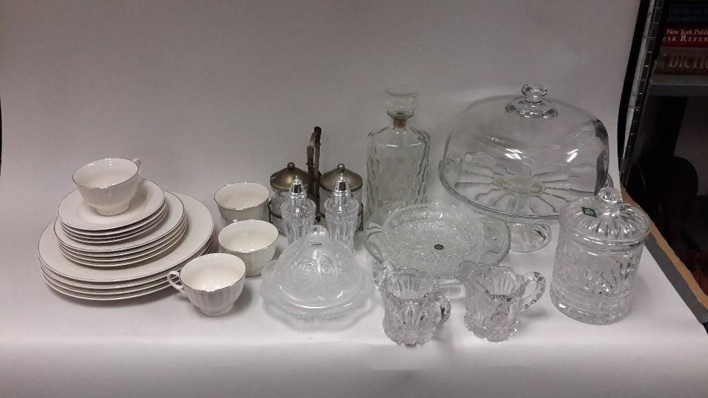 Clear Glass & China Dishware: Large assortment includes glass cake plate with cover, turning purple cut glass cream and sugar, biscuit jar, Gibson China, and more 