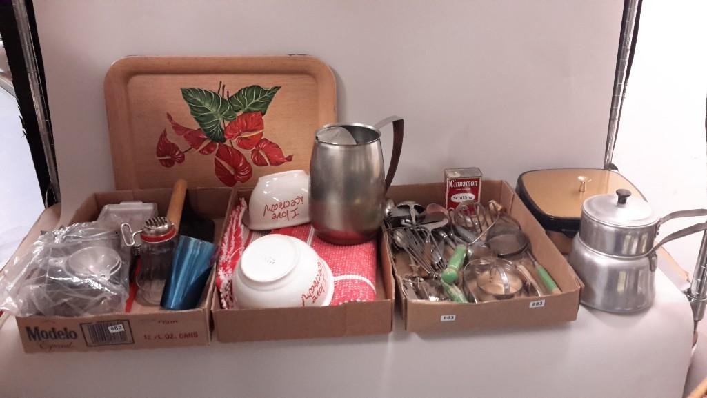 Vintage Kitchenware: Assortment includes gold and black lidded serving dish, biscuit cutters, strainers, bowls, measuring cups, and much more 