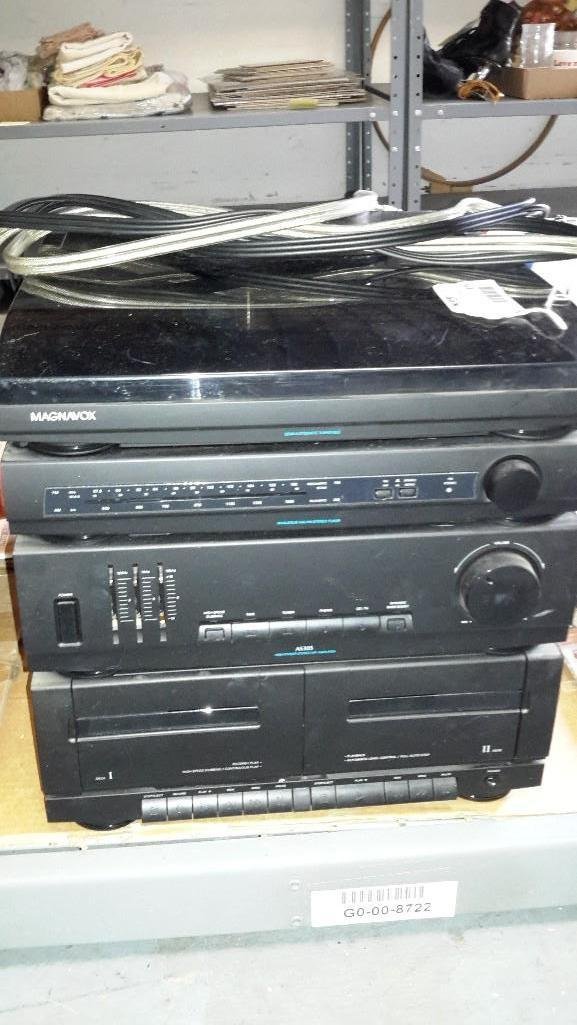 Magnavox Stereo System: Phonograph radio receiver with dual cassette. No speakers included.