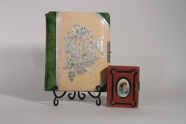 Tin Types Photos & Albums (2): Green fabric covered album contains black and white photos (partially full). Small red album contains black and white photos, tin plate photos, and a card that states: Morses Palace of Art No. 417 Mon