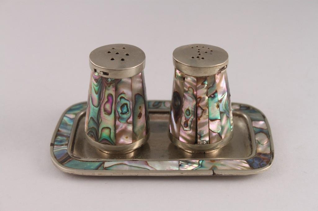 Texco Alpaca with Abalone Salt & Pepper set: Salt & Pepper shakers with under tray. Signed Texco Alpaca and abalone shell design. 1 3/4" tall