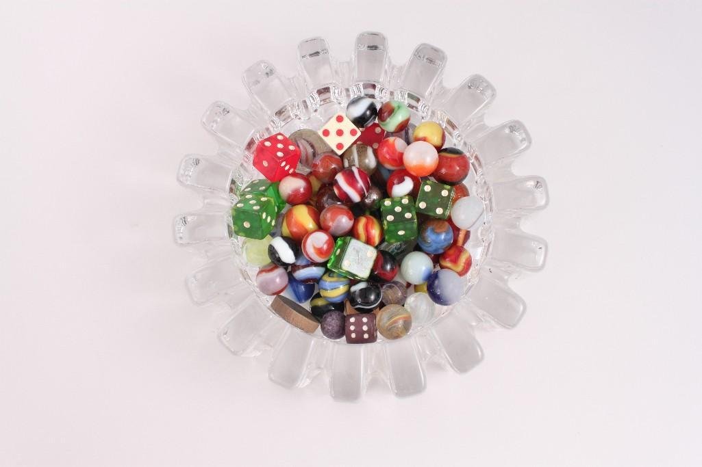 Vintage Marbles and Dice in Crystal Bowl: Old marbles (2 sizes), green, red, white Bakelite dice, one wooden dice, one white plastic dice in a heavy crystal bowl/ashtray