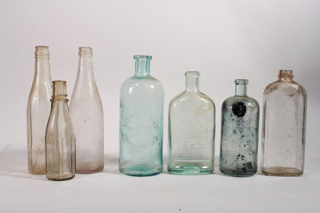 Vintage Bottles (7): Clear and Blue glass bottles one marked Red Ribbon Brand, San Francisco CA. One marked Fellows Syrup, and more.