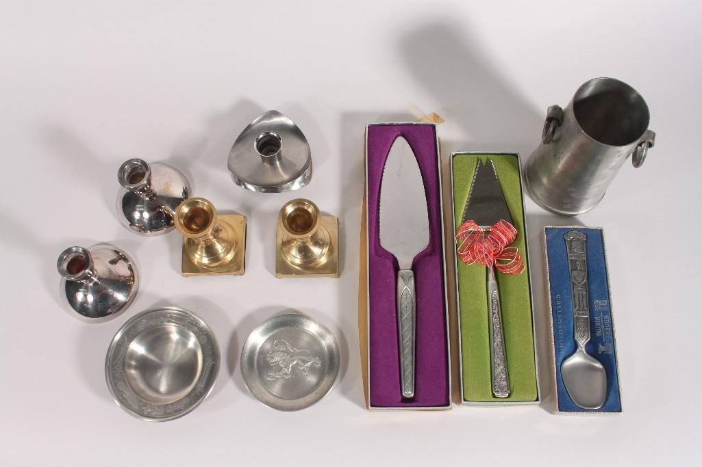 Metal Flatware and Candle Holders: Hammered metal vase, metal coaster, ashtray, brass candle holders and serving utensils.