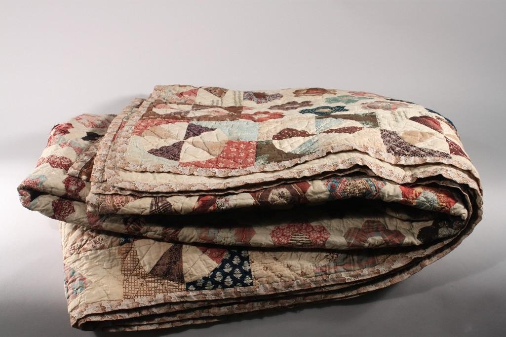 Hand Crafted Vintage Quilt: 99" x 88", has flower pattern, multi colored with cream background, has some stains