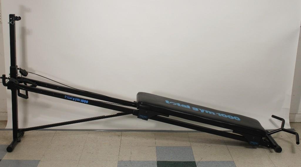 Total Gym 1000 Exercise Unit: Measures 97" long, folds for easy storage