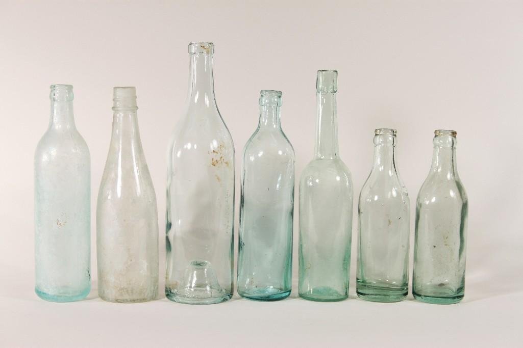 Vintage Glass Bottles (7): Green and aqua glass bottles, some are hand blown, in good condition for age
